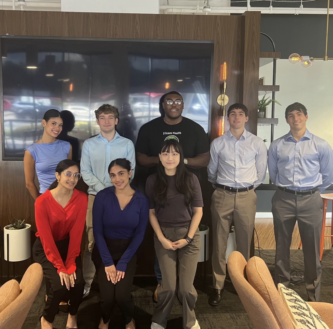 Program team assembled after a live research and fellowship program session